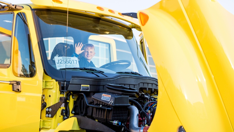 Student in the front seat of Cummins' truck