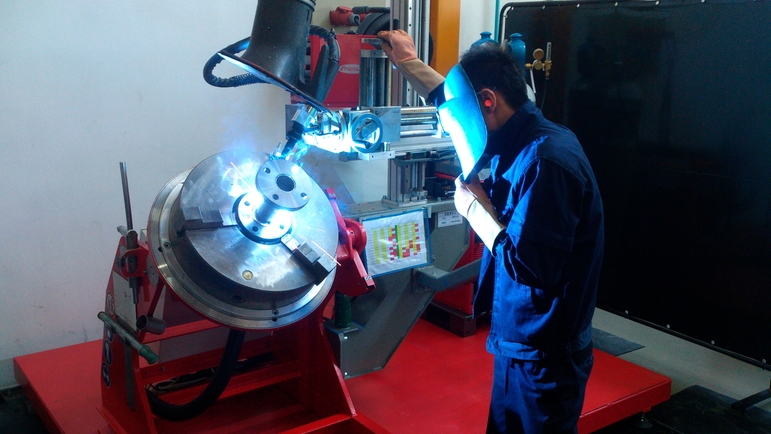 Endress+Hauser Flow China, Suzhou, man welding measuring tube
